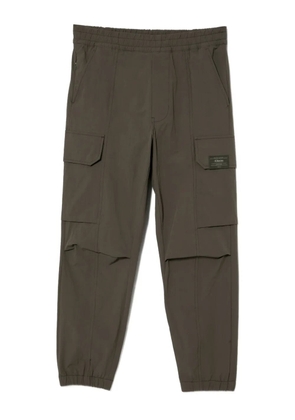 CHOCOOLATE logo-patch trousers - Grey