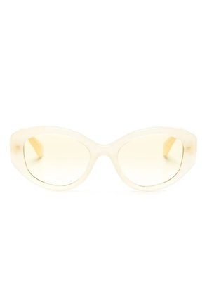 Swarovski Eyewear crystal-embellished oval-frame sunglasses - Yellow