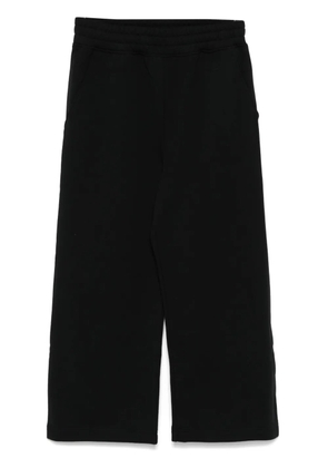 Moschino logo-raised sweatpants - Black