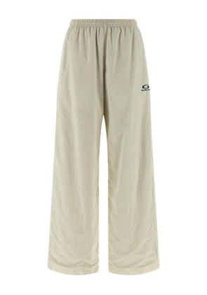 Balenciaga wrinkled-effect logo-embroidery trousers - Neutrals