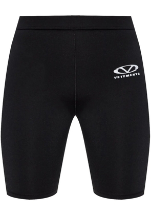 VETEMENTS logo-print track shorts - Black
