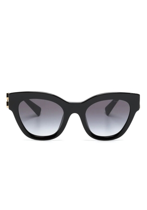 Miu Miu Eyewear logo-lettering 01YS sunglasses - Black
