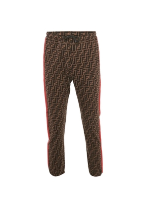 Fendi Pre-Owned Zucca-print stripe-detail trousers - Brown