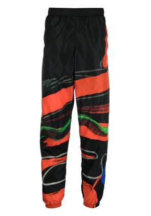 Moschino abstract-print track pants - Black