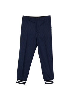 Moschino striped-cuff trousers - Blue