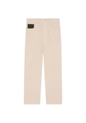 Drôle De Monsieur Jean logo-patch trousers - Neutrals