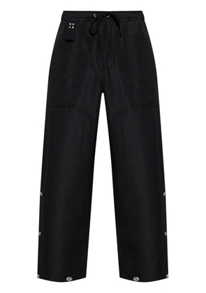 Comme des Garçons Homme decorative button trousers - Black