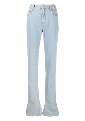 The Attico elongated flared jeans - Blue