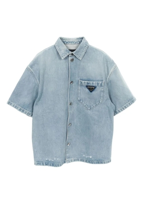 Prada Pre-Owned 2010s logo-plaque denim shirt - Blue