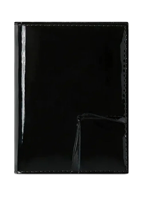 Comme Des Garçons Wallet Reversed patent-leather wallet - Black
