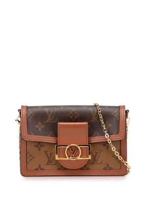 Louis Vuitton Pre-Owned 2021-2025 Monogram Reverse Dauphine Wallet on Chain crossbody bag - Brown