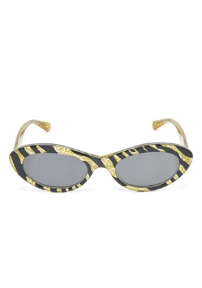 Alexander McQueen Pre-Owned zebra-print cat-eye sunglasses - Yellow