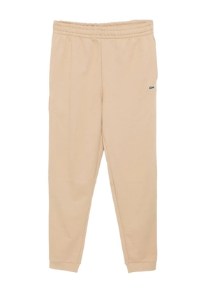 Lacoste logo-embroidered trousers - Neutrals