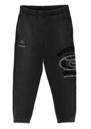 AAPE BY *A BATHING APE® patched track pants - Black