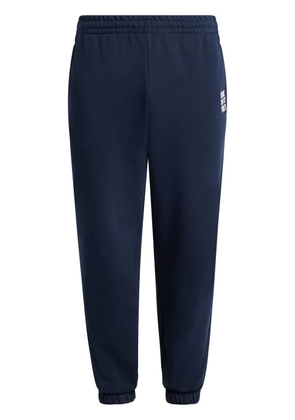 Lacoste slogan-embroidered elasticated track pants - Blue