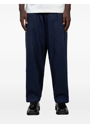 Universal Works pleated-front trousers - Blue