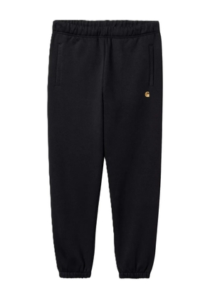 Carhartt WIP logo-detail cuffed track pants - Blue