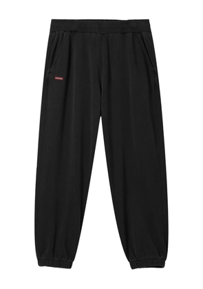 izzue elasticated-cuff cotton track pants - Black