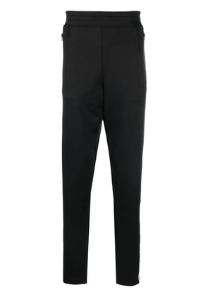 Moschino logo-print track pants - Black