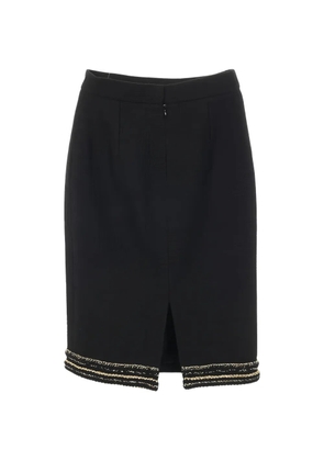 CHANEL Pre-Owned embellished-hem skirt - Black