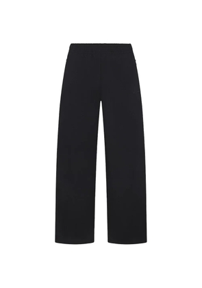 Skims x Nike logo track pants - Black