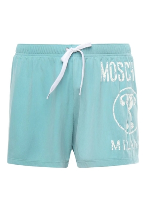 Moschino logo-print swim shorts - Blue