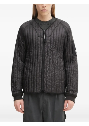 C.P. Company quilted logo-patch jacket - Black