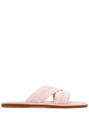 Ferragamo logo-jacquard crossover-strap slides - Pink
