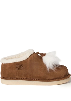 Miu Miu logo-lettering suede slip-ons - Brown