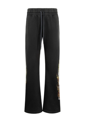 Who Decides War Flame Glass track pants - Black