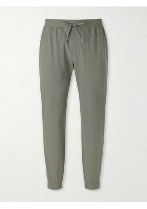 Lululemon - ABC Tapered Warpstreme™ Drawstring Trousers - Men - Green - S