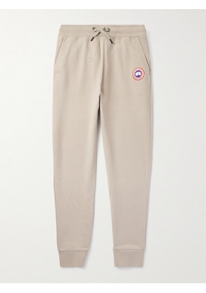 Canada Goose - Huron Tapered Logo-Appliquéd Cotton-Jersey Sweatpants - Men - Neutrals - XS