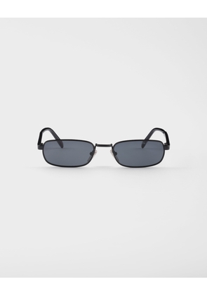Sunglasses with the iconic metal plaque