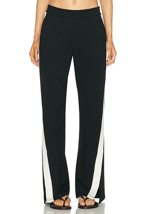 THE UPSIDE Petra Flare Pant in Black - Black. Size L (also in M, S).