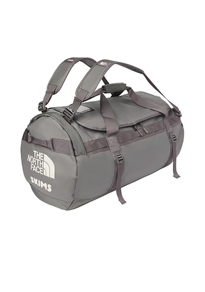The North Face x SKIMS Large Base Camp Duffel Bag in SK Gunmetal - Charcoal,Black. Size all.