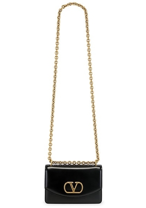 Valentino Garavani Vain Small Shoulder Bag in Nero - Black. Size all.