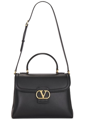 Valentino Garavani 9to5 Large Top Handle Bag in Nero - Black. Size all.