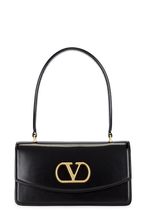 Valentino Garavani Vain Top Handle Bag in Nero - Black. Size all.