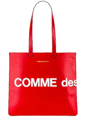 COMME des GARCONS Huge Logo Tote Bag in Red - Red. Size all.
