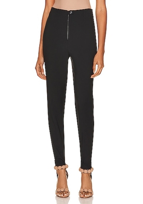 ALAÏA Stirrup Pant in Noir - Black. Size 40 (also in 44).