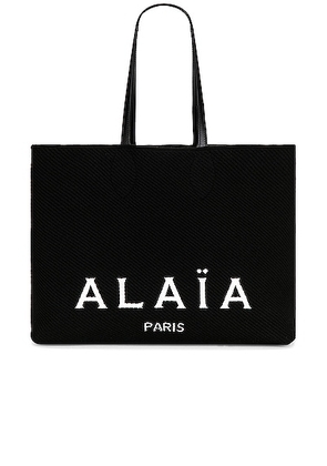 ALAÏA Small Tote Bag in Noir - Black. Size all.