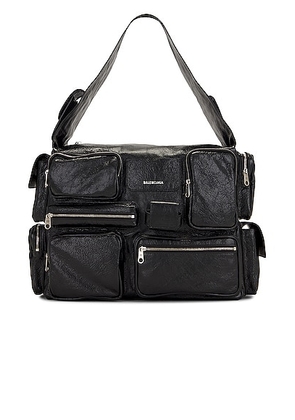 Balenciaga Superbusy Sling in Black - Black. Size all.