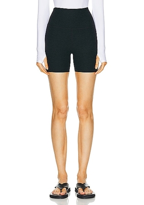 Beyond Yoga Keep Pace Biker Short in Darkest Night - Black. Size XS (also in ).