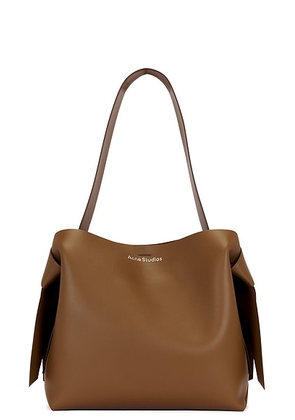 Acne Studios Musubi Midi in Camel Brown - Brown. Size all.