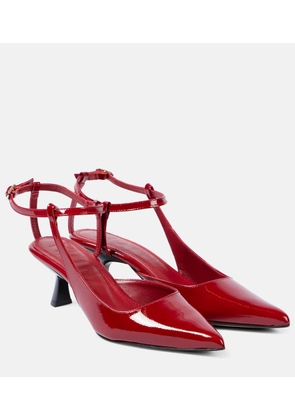 Souliers Martinez Camelia patent leather pumps