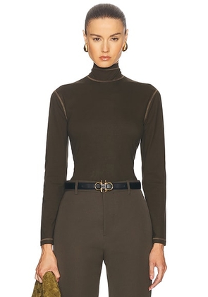 Bottega Veneta Long Sleeve Turtleneck Top in Dark Olive - Olive. Size 36 (also in 34, 40).