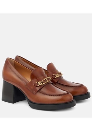 Tod's Patent leather loafer pumps
