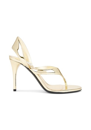 ALAÏA Thong Sandal in Platine - Metallic Gold. Size 37 (also in 40, 41).