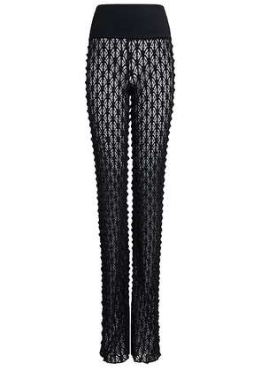 ALAÏA Lace Flare Pant in Noir Alaia - Black. Size 34 (also in ).