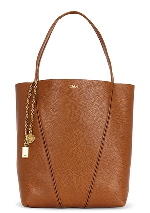 Chloe Spin Medium Tote Bag in Clay Brown - Brown. Size all.